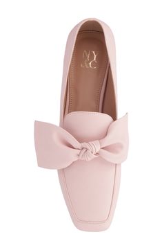 A large scale bow adds fun detail to a square, apron toe loafer with versatile style. 0.71" heel Square apron toe Bow detail Slip-on Manmade upper and sole Imported Workwear Loafers With Bow And Round Toe, Flat Heel Loafers With Bow For Workwear, Chic Pink Loafers For Office, Elegant Bow Loafers With Round Toe, Chic Square Toe Loafers For Spring, Chic Pink Flat Loafers, Spring Formal Loafers With Bow Detail, Chic Pink Loafers For Formal Occasions, Flat Bow Loafers For Workwear