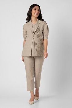 Natural blazer with dainty bloom print and zari embroidery on hem. Paired with inner and pant. - Aza Fashions Elegant Embroidered Pant Set For Work, Fitted Workwear Sets With Floral Embroidery, Fitted Floral Embroidery Sets For Workwear, Fitted Sets With Floral Embroidery For Work, Fitted Floral Embroidery Sets For Work, Elegant Cotton Pant Set With Floral Embroidery, Festive Floral Embroidered Sets For Workwear, Fitted Cotton Sets With Straight Pants, Festive Fitted Pants For Workwear