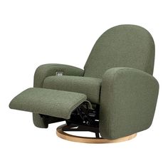 a green recliner chair sitting on top of a wooden base