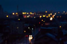 blurry cityscape at night with street lights