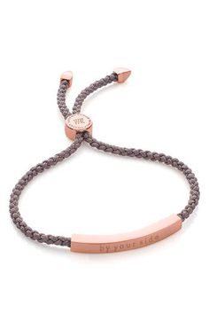 A luxurious take on a traditional friendship bracelet, this sleek style is accented with a gleaming curved bar. A slide closure easily adjusts the cord's length for a snug fit. 1 1/4"L x 1/8"W bar Adjustable slide closure Can be engraved; >see locations Sterling silver with 18k-gold plate/textile Imported Exclusive US retailer Bracelet Rose Gold, Curved Bar, Sleek Style, Monica Vinader, Sleek Fashion, Keep Jewelry, Adjustable Bracelet, Friendship Bracelet, Fashion Advice