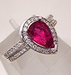 AAA Rubellite Pink Tourmaline  1.30 Carats   in 14K White gold Bridal set .40cts of diamonds. 1618 Elegant Pink Ruby Gemstones, Pink Diamond Gemstones For Gift, Pink Gemstones With Prong Setting For Anniversary, Elegant Pear-shaped Pink Ruby Ring, Elegant Pink Pear-shaped Ruby Ring, Gold Bridal Set, White Gold Bridal Set, Rosy Pink, Bridal Set