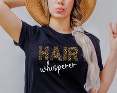 📦 Delivery dates - order by December 12th for Christmas delivery in the US and UK. 📦 Hair Whisperer shirt. The perfect shirt for your favourite hairdresser. Buy it for yourself or give it as the perfect gift. Sizing:  For your perfect fit, lay a T-shirt down and measure across chest as indicated in size picture. Before ordering please check our size chart (last picture of the listing) for measurements. Available sizes: S, M, L, XL, 2X (other sizes may be available on request) Cleaning instruct Braid Business, Gift For Hairdresser, Hair Stylist Shirts, Cosmetologist Gifts, Hairdresser Gift, Hair Stylist Gifts, Stylist Outfit, Shirt Hair, Christmas Delivery