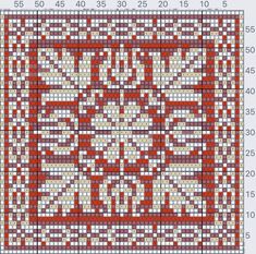 a red and white quilt with squares on it's sides, as well as numbers