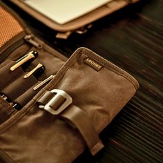 an open brown bag sitting on top of a wooden table