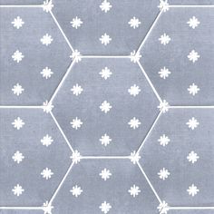 a gray and white wallpaper pattern with hexagons in the middle,