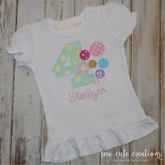 This personalized bubbles birthday shirt is perfect for any little girl's birthday bubbles party. This fun and colorful shirt is the perfect thing for your little one to wear to her bubbles birthday party. This bubbles birthday outfit features this set of bubbles along with bubble blower embroidered design. This bubbles birthday shirt will be customized with the birthday number of your choice and overlapping bubbles in your choice of colors. All fabrics and colors can be changed to match your pa Fun Fitted T-shirt For Birthday, Cute Personalized Tops For First Birthday, Personalized Multicolor Birthday T-shirt, Customizable Cute Tops For Birthday, Playful Customizable Tops For Birthday, Personalized Cute Tops For Playtime, Multicolor Tops For Birthday, Fun Fitted Birthday Tops, Customizable Cute Tops For Birthday Gift