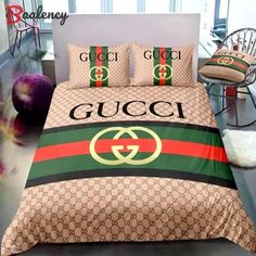 a bed with gucci logo on it in a room