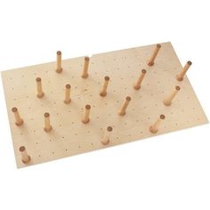 a wooden peg board with several holes in it