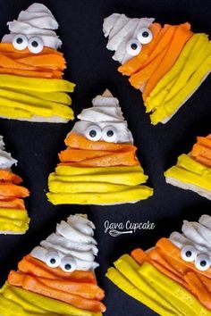 halloween treats made to look like candy cornbreads with eyes and mouths on them