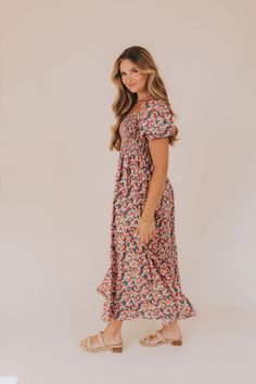 Get ready to turn heads with our Over The Hills Dress! Featuring a square neckline, puffy sleeves, and a smocked bodice, this maxi dress also has pockets for added convenience. Stand out with its stunning multi-color leaf pattern. Add some fun to your wardrobe today! Details Square neckline Puffy sleeves Smocked bodice Pockets Maxi length Multi-color leaf pattern Sizing Approximate measurements: SIZE LENGTH BUST Small 53" 28" Medium 54" 30" Large 54" 32" Fabric has some stretchModel is 5’9 weari Nursing Friendly Tops, Nursing Friendly Dress, Plus Jumpsuit, Exclusive Dress, Maternity Shops, Basic Dress, Tank Top Long Sleeve, Puffy Sleeves, The Hills