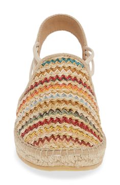 A cushy insole extends the everyday comfort of a breezy espadrille flat featuring a slingback strap and elasticized cords to perfect the fit. 1 1/4" heel; 3/4" platform (size 39) 3" strap height Slip-on style Textile upper and lining/synthetic sole Made in Spain Women's Shoes Casual Slingback Sandals With Woven Sole, Textile Closed Toe Sandals For Vacation, Closed Toe Textile Sandals For Vacation, Comfortable Straw Espadrilles With Cushioned Footbed, Everyday Summer Sandals With Woven Sole, Casual Adjustable Espadrilles With Woven Sole, Slip-on Synthetic Espadrilles For Beach, Spring Slip-on Adjustable Espadrilles, Casual Sandals With Rubber Sole In Natural Color