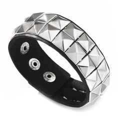 PRICES MAY VARY. [Product Material]:this cuff bracelet made of alloy and pu leather,the addition of pu leather gives the bracleet an elegant texture. [Product Weight]:this weight of wristband is 25g. [Bracelet Width]:this width of leather bracelet is 27mm. [Bracelet Length]:this length of arm cuff bracelet is 240mm. [Product Design]:this bracelet has a unique punk rock style. the wristband is adjustable design, which can be easily adjusted according to your wrist size. Pitmmord Shop is a brand d Studded Bracelet, Punk Rock Style, Arm Cuff Bracelet, Leather Wristband, Leather Wristbands, Punk Rock Fashion, Arm Cuff, Punk Rock, Pyramid