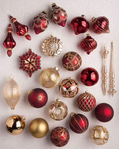 a collection of red and gold christmas ornaments