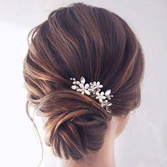 a woman wearing a bridal hair comb