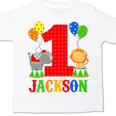 a white shirt with the number one on it and two balloons in front of it