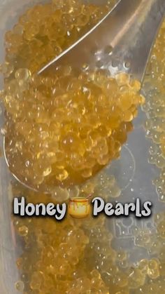 honey pearls in a bowl with a spoon