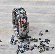 a ring with many small pieces of glass on the ground