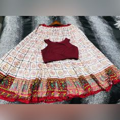 Indian Traditional Look, Skirt And Blouse, White And Maroon Color, Brand New. Very Elegant Look. Fits Small To Medium Women. Skirt Length 36” White Bohemian Flared Skirt Dress, White Bohemian Dress With Flared Skirt, Fitted White Long Skirt Set, Fitted White Set With Long Skirt, White Fitted Long Skirt Set, White Festive Long Skirt Sets, White Festive Sets With Long Skirt, Festive White Long Skirt Set, Festive White Sets With Long Skirt