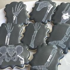 decorated cookies with skeleton images on them