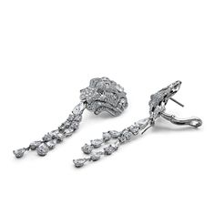 Chanel Lion Royal Earrings, Medium Version, White Gold, Diamonds Details 18k White Gold 1 Pear Cut Diamond .75cts (E-VVS2) 1 Pear Cut Diamond .75cts (F-IF) 28 Fancy Cut Diamonds 6.77cts (F+ - VVS+) 472 Round-Cut Diamonds 4.03cts (F-G - VVS1/2) *Comes with original box and certificate. *These Chanel earrings are unique. UK retail £175,000 with vat. UK retail £145,000 without vat.Product Number: J60875 Luxury Hand Set Round Diamond Earrings, Luxury Pave Set Diamond Dangle Earrings, Luxury Diamond Dangle Earrings With Pave Setting, Luxury Diamond Bridal Earrings With Pave Setting, Luxury Diamond White Platinum Cluster Earrings, Luxury Diamond Chandelier Earrings, Luxury Platinum Cluster Earrings In Diamond White, Luxury Platinum Dangle Diamond Earrings, Luxury White Gold Cluster Drop Earrings