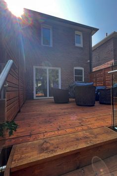 the sun shines brightly on a wooden deck