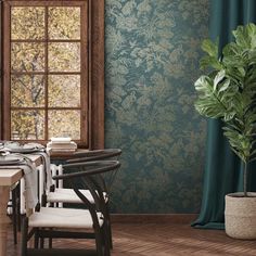 a dining room with green wallpaper and white chairs in front of an open window