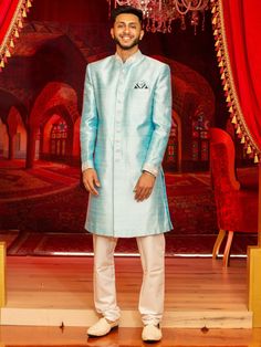 Color - Blush Baby Blue Customization of this Sherwani will require 4 weeks. Woven Silk Jacquard Sherwani in Sky blue, comes with Gold pants. Available Size: 40, 42, 44 (Ready to Ship)For all other sizes Customization: 3 to 6 weeksDupatta/ Shawl, Mojari/ shoes, Safa/ Pagri and Jewelry can be customized as per requirement. Indian Bridal Couture, Gold Pants, Color Blush, Bridal Couture, Indian Bridal, Baby Blue, Sky Blue, Blue Sky, Shawl