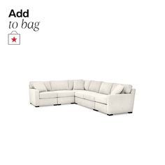 a white sectional couch with the words add to bag on it's left side