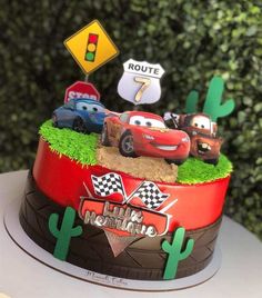 a birthday cake with cars on it