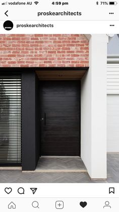 an instagramted photo of a black door in front of a brick building