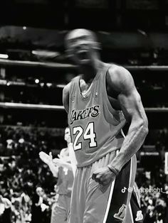 a basketball player standing on top of a court with his hands in his pockets and mouth open