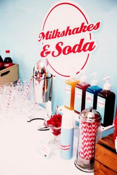 a table topped with lots of different types of soaps and lotions on top of it