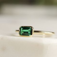 Bezel Set Emerald Ring, Emerald Cut Emerald Ring, East West Minimalist – Melt'm Jewelry Emerald Engagement Ring Bezel, Emerald Cut Emerald Ring, East West Ring, Emerald Gold Ring, Engagement Ring Bezel, Gold Emerald Ring, Gold Ring Band, Jewelry Design Studio, May Birthstone Rings