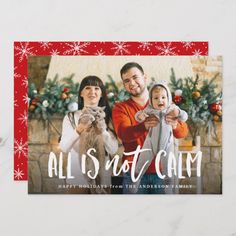 a christmas card with the words, all is not calm and an image of two people holding