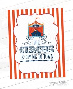 the circus is coming to town sign with an orange and white striped frame on it