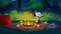 a cartoon dog sitting in front of a campfire