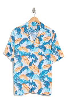 An allover frond print brings vacation-ready appeal to a cool camp shirt perfect for breezy, warm days. Front button closure Notched collar Short sleeves 100% viscose Machine wash, line dry Imported Patterned Hawaiian Shirt With Camp Collar, Patterned Camp Collar Hawaiian Shirt, Patterned Hawaiian Shirt With Tropical Print And Camp Collar, Patterned Tropical Print Hawaiian Shirt With Camp Collar, Blue Camp Shirt For Beach In Spring, Patterned Hawaiian Shirt For Vacation, Hawaiian Patterned Shirt For Vacation, Collared Camp Shirt With Hibiscus Print For Summer, Blue Hawaiian Shirt With Tropical Print For Vacation