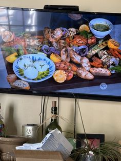 a large television screen with food on it