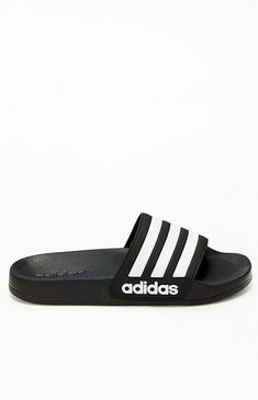 Enjoy your casual days in style and comfort thanks to the Kids Black Adilette Slide Sandals by adidas. These go-to slides have a single-strap design with 3-Stripes detailing and contoured footbeds for all-day comfort.Two-tone slidesadidas branding3-Stripes detailingThick single strapContoured footbedsTextured outsoles adidas Kids Black Adilette Slide Sandals size 2 Kids Adidas Sporty Slides With Rubber Sole, Adidas Sports Slides With Rubber Sole, Adidas Logo Sport Sandals, Adidas Sporty Slides For Streetwear, Sporty Adidas Logo Slides For Streetwear, Adidas Sport Sandals With Logo For Sports, Adidas Slip-resistant Slip-on Slides, Sporty Adidas Slides For Beach, Adidas Cushioned Sports Sandals