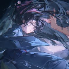 an anime character laying down in the water