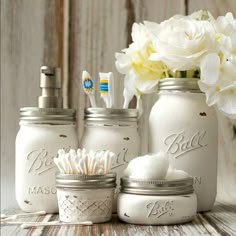 an instagram page with white flowers and mason jars