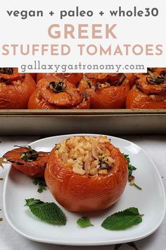 some stuffed tomatoes are sitting on a plate