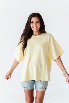 Features Round Neck Short Sleeves Pastel Yellow Color 100% Cotton Size + Fit Small 0-4, Medium 4-8, Large 8-12 Kristin is 5'4", a size 1 and is wearing a Small Oversized fit, size down if you want less oversized. Above recommendation is for an oversized fit. Click here for shorts in photos Click here for shorts in Aimee's try on video