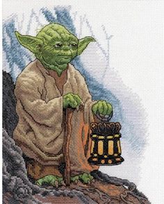 an image of yoda holding a lantern