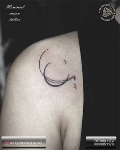 a woman's thigh with a crescent and stars tattoo on the back of her thighs