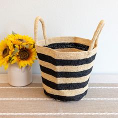 IN STOCK NOW SHIPPING FROM LOS ANGELES Add some summer vibes to your wardrobe with Elena Handbags' Raffia Basket Bag. Perfect for a day at the beach or a summer picnic, this bag features a stylish striped design and is made from durable and lightweight raffia material. Stay on trend and stand out with this must-have summer fashion accessory! Natural Soft Raffia Straw Handmade Size: 9"H x 14"W x 7"D Designer Style ID: 8652 Chic Beach Tote Bag For Picnic, Bucket Shaped Beach Bag For Everyday Use, Everyday Use Bucket Beach Bag, Everyday Bucket Beach Bag For Beach Season, Bucket Shaped Beach Bag For Beach Season, Black Bucket Beach Bag For Beach Season, Beachy Bucket Bag For Travel, Large Capacity Bucket Bag For Picnic, Chic Beach Season Picnic Bags