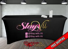 a black table cover with the words stay vii and stay with vii on it