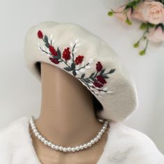 The hand embroidered floral wool beret is a stunning and unique headpiece made with high-quality wool material. Featuring delicate and intricate floral embroidery, each beret is carefully crafted by hand, making it a one-of-a-kind accessory.  Material: 100% wool Size: inner diameter measures 6 inches, outer diameter measures 11 inches, inner circumference measures 20 inches. Beret can be stretch out slightly by gently pulling around the brim, making it fit head sizes from 20-22.8 inches. Color: I can embroider the pattern on any color beret that you request. If no message is included with the order, the default color would be the same as the photo. Washing instruction: because the wool beret is a delicate material, putting in washing machine will damage both the hat and the embroider. Hand Beret Embroidery, Winter Fashion For Women, French Hat, Wool Beret, Hand Making, Embroidered Wool, Wool Berets, Winter Mode, Christmas Women