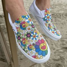 Takashi Murakami Rainbow Flower Sneakers - Custom Slip On Vans – BlvdCustom Custom Slip On Vans, Shoes Artwork, Flower Sneakers, Black Slip On Vans, Sunflower Vans, White Slip On Vans, Custom Vans Shoes, Slip On Vans, Diy Sneakers